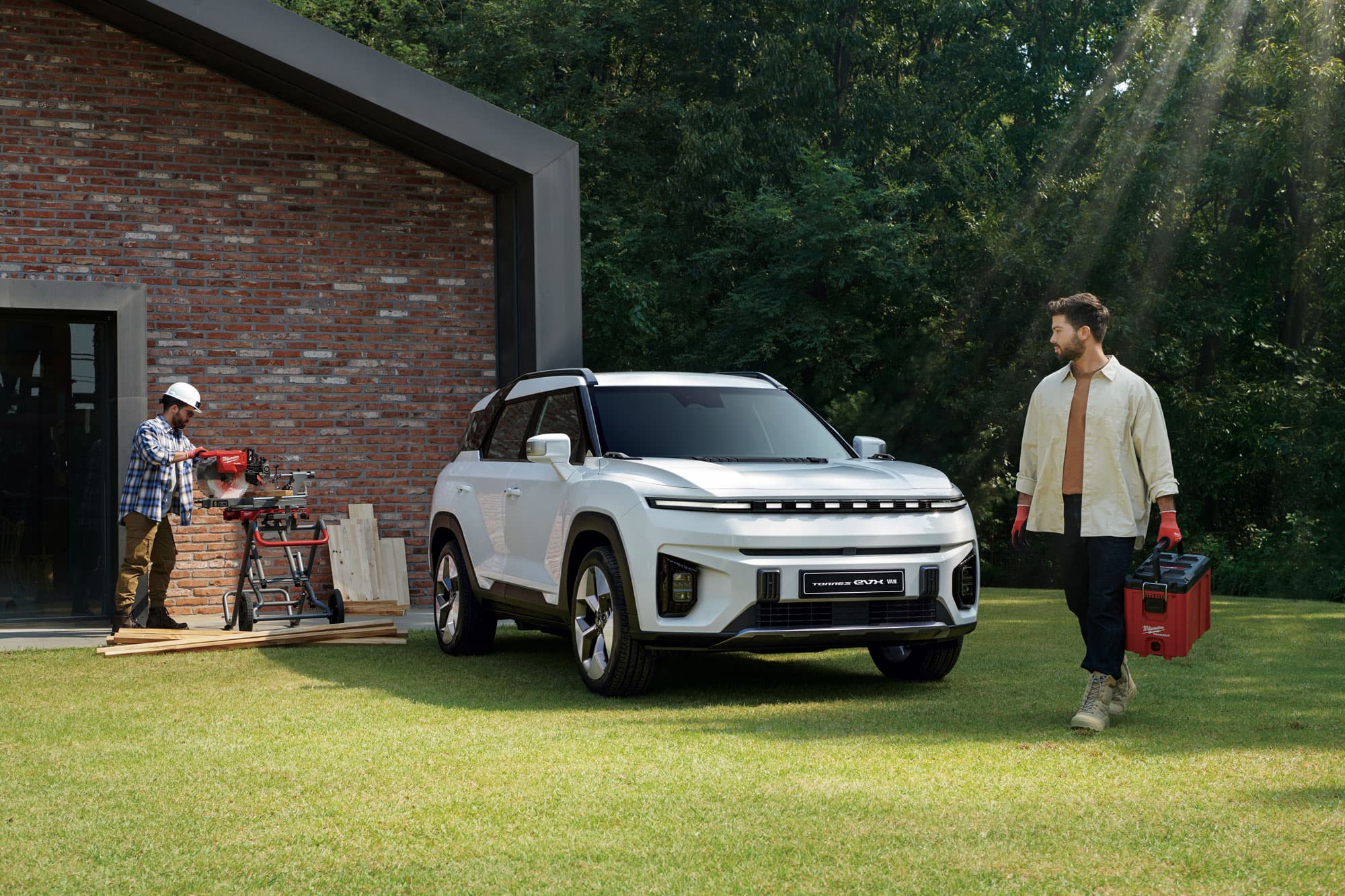 KGM Torres EVX VAN parked in garden